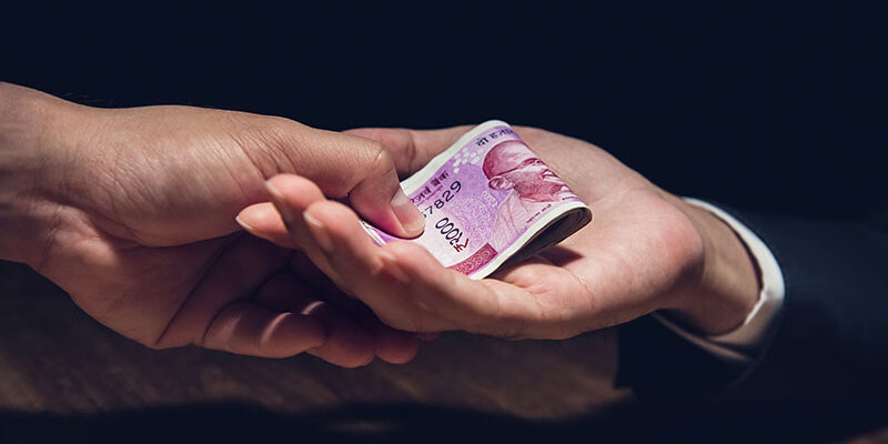 official taking bribe. charges framed. review petition